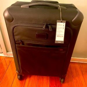 Brand new with tags Tumi corporate travel suitcase